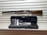 USED BERETTA 686 28 GAUGE SILVER PIGEON WITH ORIGINAL HARDCASE CYL, IMP CYL, MOD, IMP MOD ORIGINAL TOOL AND MANUALS - 1 of 23