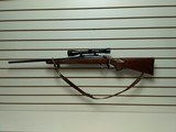 USED REMINGTON MODEL 700 WITH SCOPE AND LEATHER SLING - 1 of 15