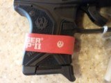 NEW RUGER LCP II
380 ACP 2.75 INCH BARREL SOFT HOLSTER, LOCK, MANUALS - 13 of 18