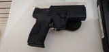 Barely used Smith and Wesson M&P 2.0 9 mm with case and accessaries - 2 of 19