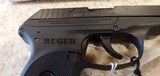 USED RUGER LCP 380 ACP WITH ORIGINAL BOX. POUCH LOCK AND MANUALS REALLY NICE CONDITION - 9 of 12