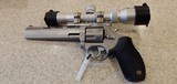 Used Taurus Tracker .17 HMR stainless with black grips includes long range nikon BDC scope - 1 of 16