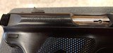 Used Ruger Mark III 22LR with case and extras - 9 of 15