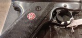 Used Ruger Mark III 22LR with case and extras - 10 of 15