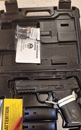 New Ruger American
9 mm
4" barrel
hard plastic case extra mag - 1 of 16