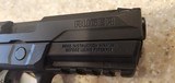 New Ruger American
9 mm
4" barrel
hard plastic case extra mag - 14 of 16
