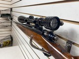 Used Remington Model 700 300 WinMag with scope good condition - 13 of 14
