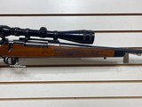 Used Remington Model 700 300 WinMag with scope good condition - 11 of 14