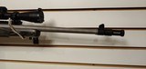Used Ruger Gunsite Scout .308 win
wood laminate with Scope very good condition - 17 of 18