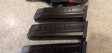 Used Ruger SR9E 9mm with 4 Mags and holster good condition - 15 of 16