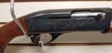 Used Remington 1100 20 gauge good condition light scuffing on stock - 12 of 19