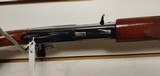 Used Remington 1100 20 gauge good condition light scuffing on stock - 18 of 19