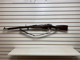 Used Russian Mosin-Nagant 7.62x54r fair condition bore is dirty and rifling is worn with leather strap - 1 of 16