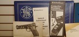 Used Smith and Wesson Model 52-2 38 Specia very good condition original box extra magazine cleaning brushes - 2 of 19