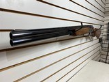 Used Browning Citori 12 Gauge (found the case and chokes) 28" barrel 8 chokes leather case
very good condition - 3 of 25