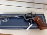 Used Smith & Wesson Model 14 38 special original box paperwork and cleaning rod good condition - 2 of 8