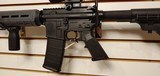 Used Smith and Wesson M&P 15 5.56 16" barrel handgrip adjustable stock muzzle break 2 30 round mags and soft case and scope good condition - 4 of 21