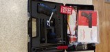 New SAR9 Blue 9mm , Hard Plastic Case, grip adjusters, 2 -17 magazines, lock , manual, extras see photos new condition - 2 of 19