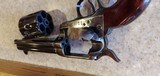 Used Taylor/Uberti 1873 4 3/4" barrel .45 Colt good condition with original box - 10 of 18