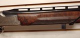 New Browning XT AT American
Trap 12 Gauge 32" barrel Adjustable comb Millers Special engraving pattern with accessories - 20 of 25