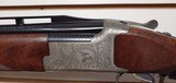 New Browning XT AT American
Trap 12 Gauge 32" barrel Adjustable comb Millers Special engraving pattern with accessories - 7 of 25