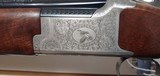 New Browning XT AT American
Trap 12 Gauge 32" barrel Adjustable comb Millers Special engraving pattern with accessories - 6 of 25