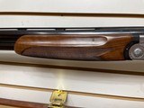 Used Beretta 687 12 gauge 28" barrel with luggage case and case good condition - 4 of 25