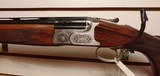 New Caesar Guerini Summit 12 Gauge 32" barrel 6 chokes 2 ic 1 m 1 lm 1 sk 1 cy luggage case and extras new in the box - 5 of 21