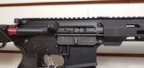 Used Bushmaster XM15-E2S 300blk 16" barrel , cookie cutter barrel attachment adjustable stock min len 33" max30 rnd mag very good conditio - 17 of 21