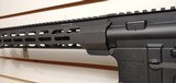 Used Bushmaster XM15-E2S 300blk 16" barrel , cookie cutter barrel attachment adjustable stock min len 33" max30 rnd mag very good conditio - 9 of 21