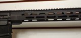 Used Bushmaster XM15-E2S 300blk 16" barrel , cookie cutter barrel attachment adjustable stock min len 33" max30 rnd mag very good conditio - 18 of 21