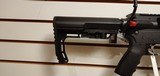 Used Bushmaster XM15-E2S 300blk 16" barrel , cookie cutter barrel attachment adjustable stock min len 33" max30 rnd mag very good conditio - 13 of 21