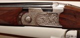 Used Beretta 687 Silver Pigeon very left handed cast 20 gauge 30" barrel 8 chokes included luggage case lube very good condition, - 8 of 25