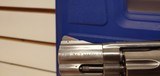New Smith and Wesson Model 686 357 Magnum 2 1/2" barrel 7 round stainless black rubber grips in hard plastic case with manuals - 7 of 22