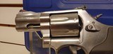New Smith and Wesson Model 686 357 Magnum 2 1/2" barrel 7 round stainless black rubber grips in hard plastic case with manuals - 5 of 22