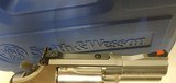 New Smith and Wesson Model 686 357 Magnum 2 1/2" barrel 7 round stainless black rubber grips in hard plastic case with manuals - 19 of 22