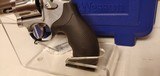 New Smith and Wesson Model 686 357 Magnum 2 1/2" barrel 7 round stainless black rubber grips in hard plastic case with manuals - 9 of 22