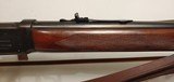 Used Winchester Model 64 24" barrel 32 Win Spl leather strap bore is clean rifling intact some bluing wear on receiver (blood?) good cond - 23 of 25