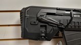 New Tri-Star Bullpup 12 Gauge 20" barrel 2 5 round magazine carry handle
front & rear sight angled foregrip new condition in box - 14 of 21