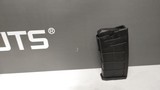 New JTS MK Gray/ Black
Semi Auto AR 12 gauge 20" barrel 2 5 round magazines flip up front and rear sights manual lock new in box reduced - 21 of 22
