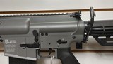 New JTS MK Gray/ Black
Semi Auto AR 12 gauge 20" barrel 2 5 round magazines flip up front and rear sights manual lock new in box reduced - 3 of 22