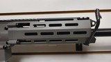 New JTS MK Gray/ Black
Semi Auto AR 12 gauge 20" barrel 2 5 round magazines flip up front and rear sights manual lock new in box reduced - 17 of 22