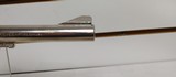 Used Colt Official Police 38 Special 4 3/4" barrelbobbed hammer very good condition stainless with black grips - 17 of 24