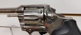 Used Colt Official Police 38 Special 4 3/4" barrelbobbed hammer very good condition stainless with black grips - 6 of 24