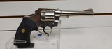 Used Colt Official Police 38 Special 4 3/4" barrelbobbed hammer very good condition stainless with black grips - 11 of 24