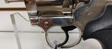 Used Colt Official Police 38 Special 4 3/4" barrelbobbed hammer very good condition stainless with black grips - 9 of 24