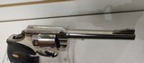 Used Colt Official Police 38 Special 4 3/4" barrelbobbed hammer very good condition stainless with black grips - 18 of 24