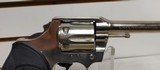 Used Colt Official Police 38 Special 4 3/4" barrelbobbed hammer very good condition stainless with black grips - 15 of 24
