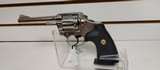 Used Colt Official Police 38 Special 4 3/4" barrelbobbed hammer very good condition stainless with black grips - 2 of 24