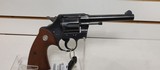 Used Colt Official Police 38 special 5" barrelblue with brown grips good condition - 13 of 19